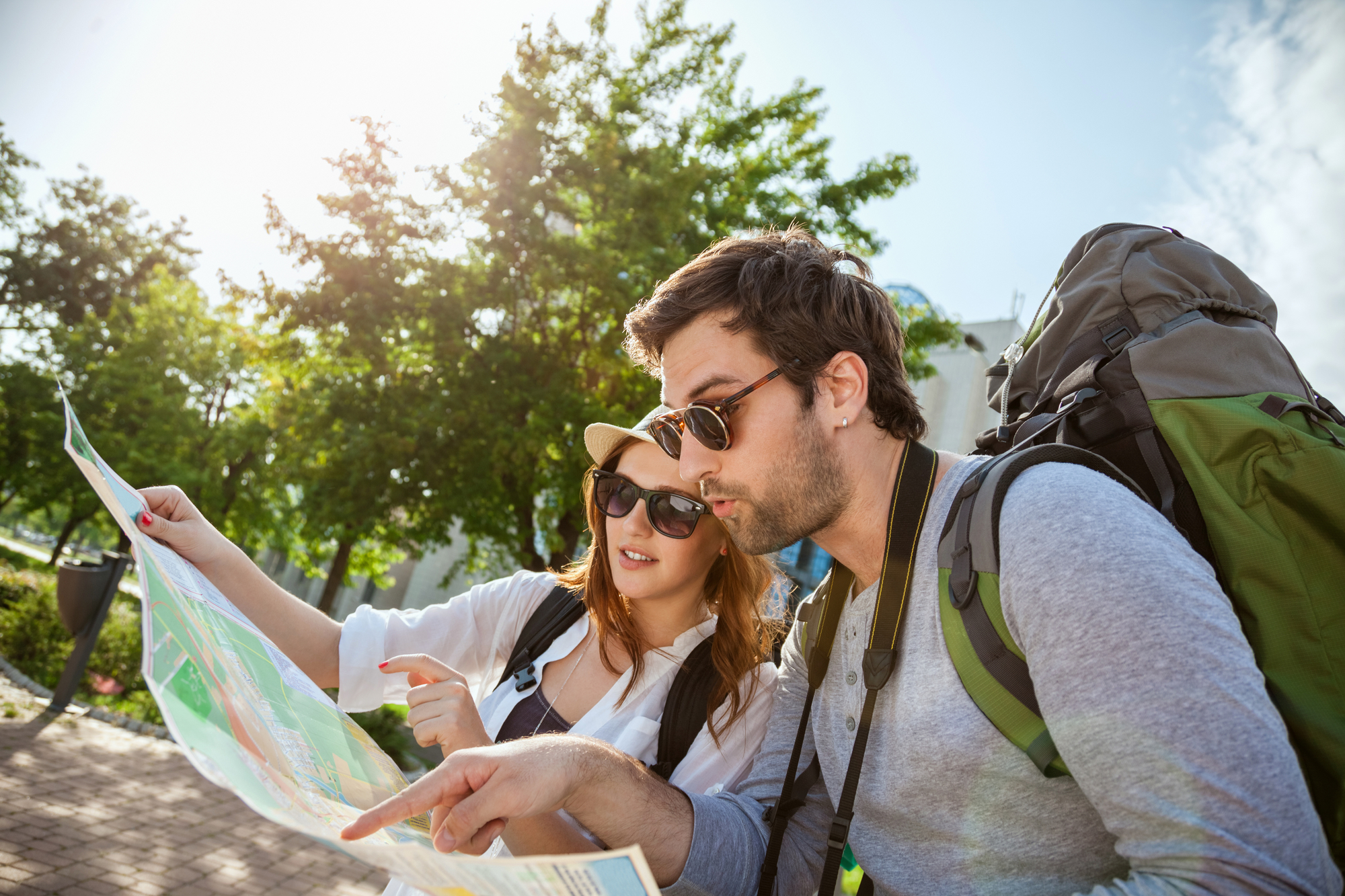 travelers using road map for destination