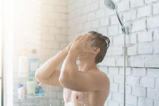 man taking a shower; healthy lifestyle