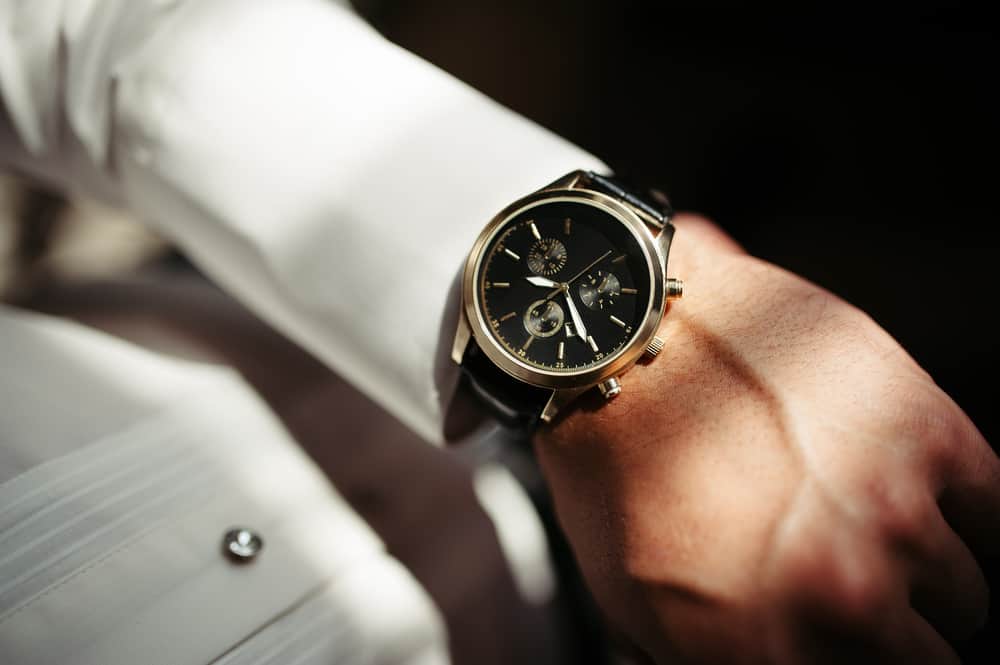 man wearing expensive watch