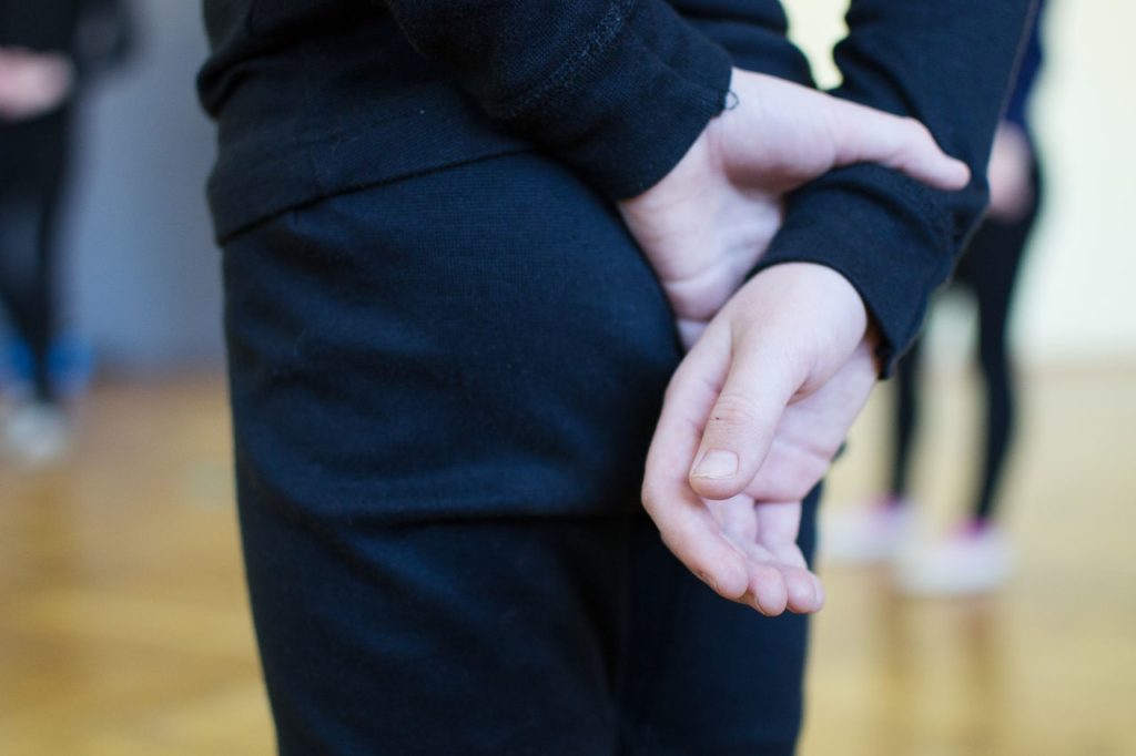 man Hand Behind Back