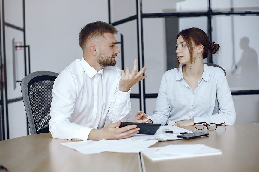 Man with a tablet. business partners at a business meeting