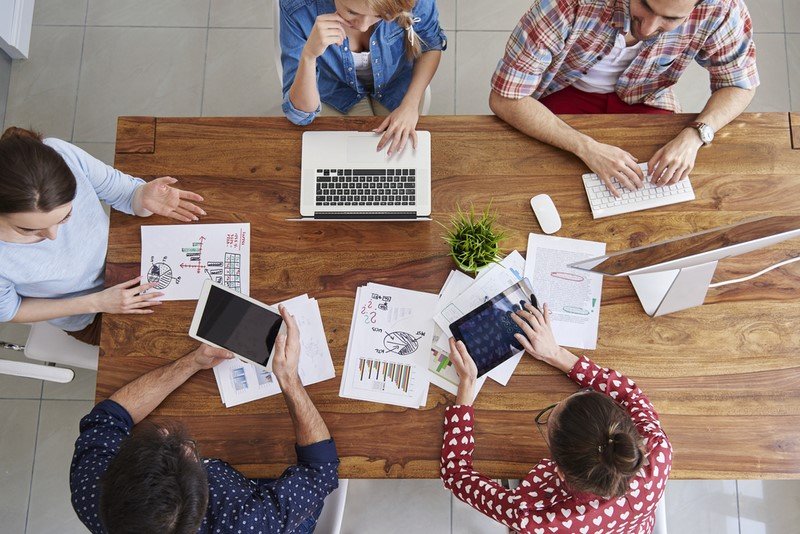 coworkers team working at office