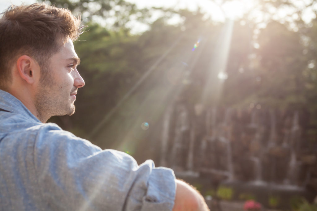 Man enjoying a view at sunset