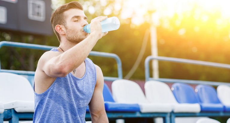 man drinking water