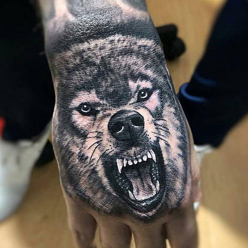 wolf hand tattoos for men