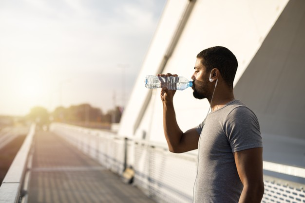 man drinking water