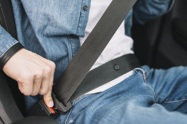 man putting safety belt