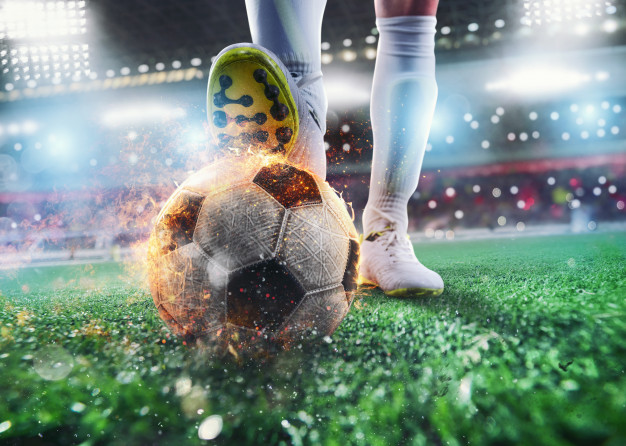 man ready to kick the ball