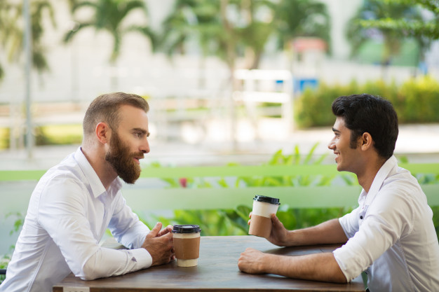 Confident businessman explaining his plan to partner 