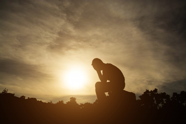 sad and depressed man sitting alone- successful lifestyle