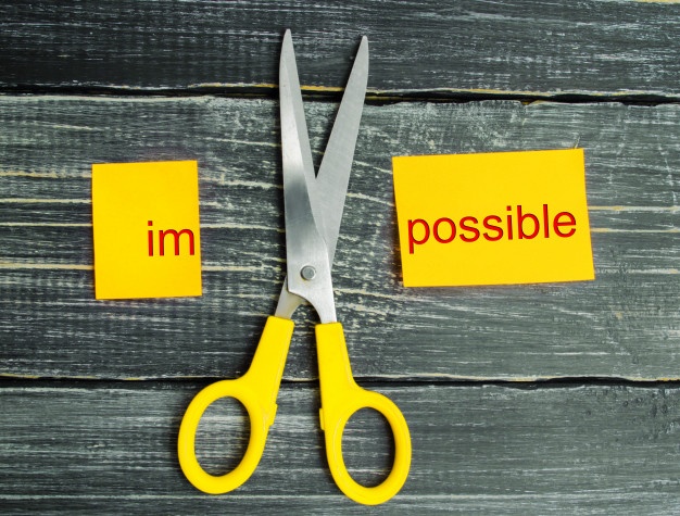 Impossible is possible concept. card with the text impossible