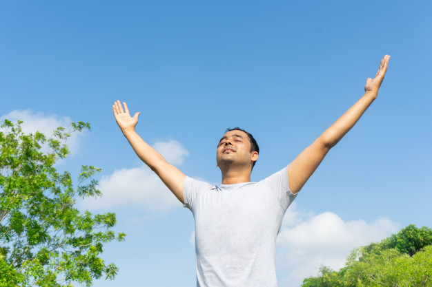 man breathing freely
