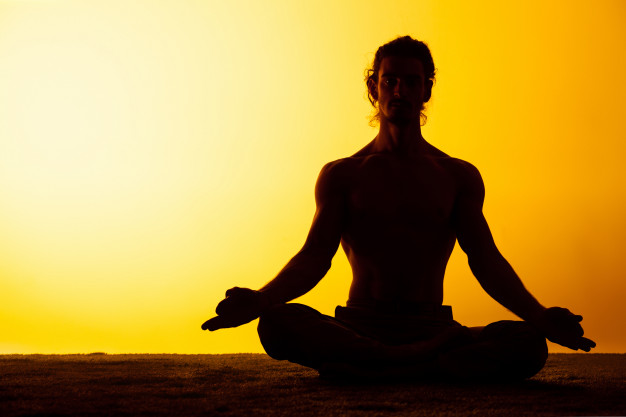 man practicing meditation