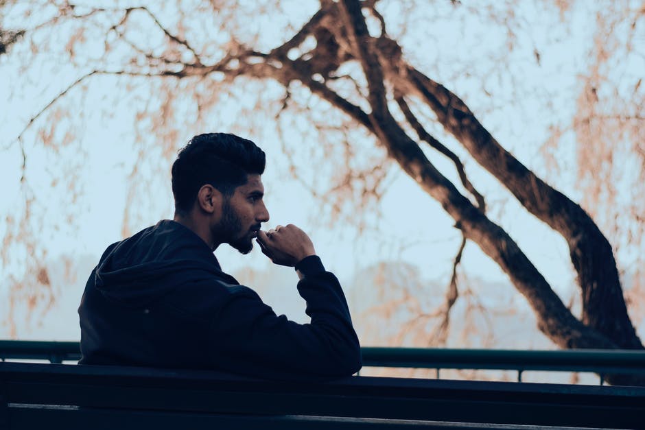 Man looking away outside