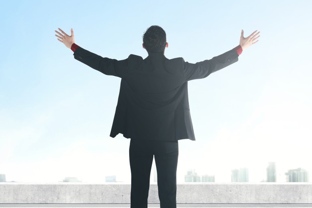 man standing alone on rooftop