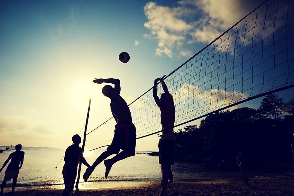 beach volleyball at sunset