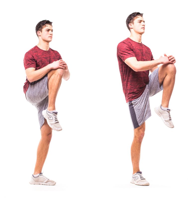 man doing high knees