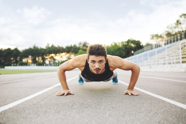 Athlete doing push-ups