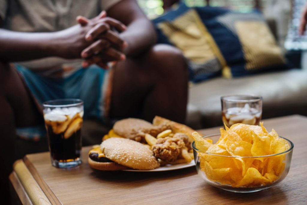  man refusing unhealthy burger