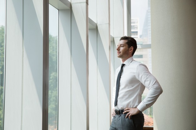 businessman at window 