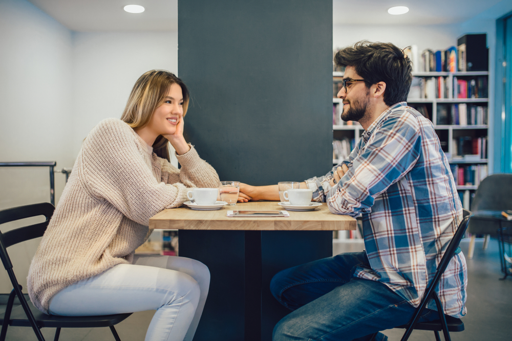 Two people in cafe enjoying the time spending with each other