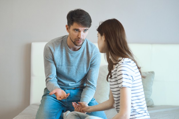 couple in the bedroom communication discontent conflicts