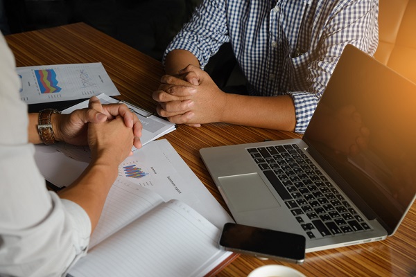 employee discuss with his boss; successful workplace for men