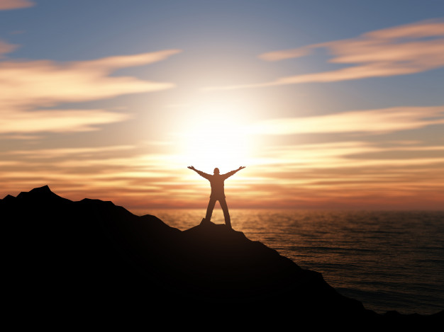 3d silhouette of a man with arms raised against a sunset ocean landscape