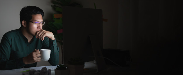 man drinking coffee at night; benefits of drinking coffee for men