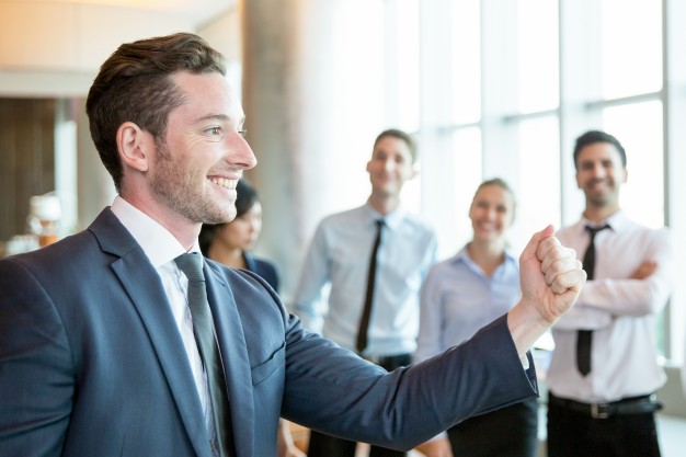 cheerful-leader-motivating-his-business-team
