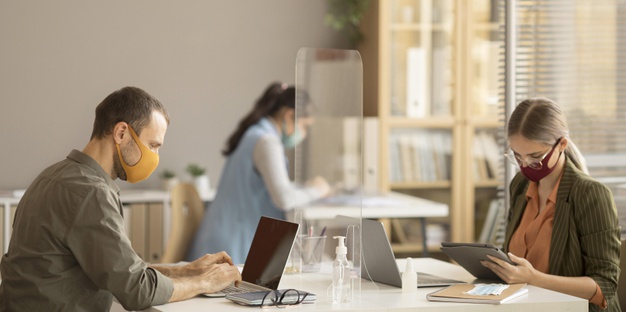 employees-wearing-face-masks-work