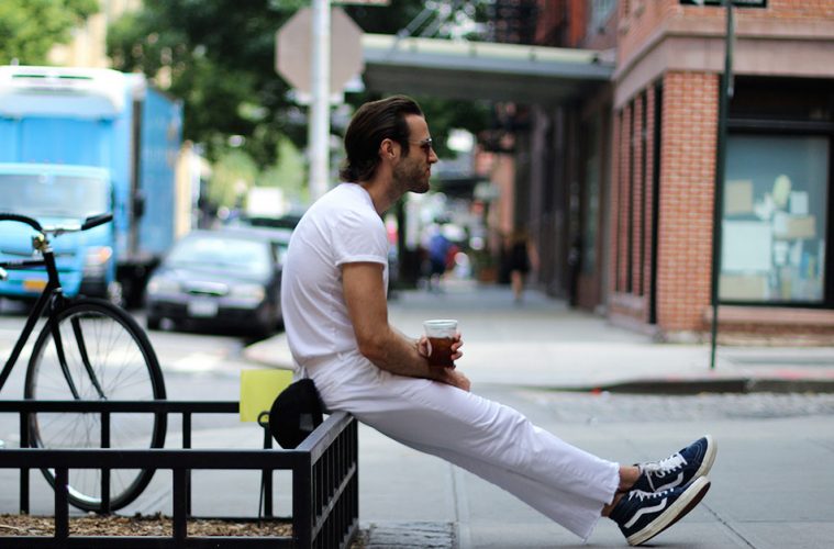 man wearing high-top sneaker