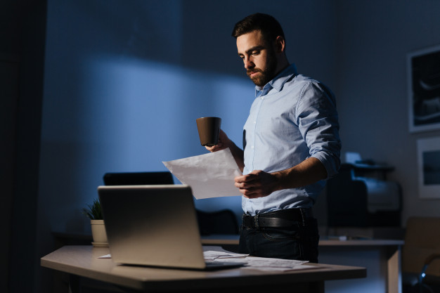 man working at night;; tips for men to be fit and healthy 