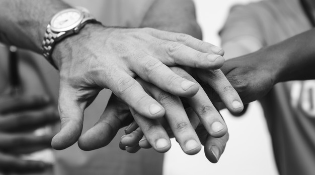 team-business-people-stacking-hands