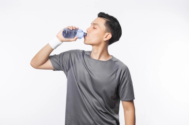 man drinking water