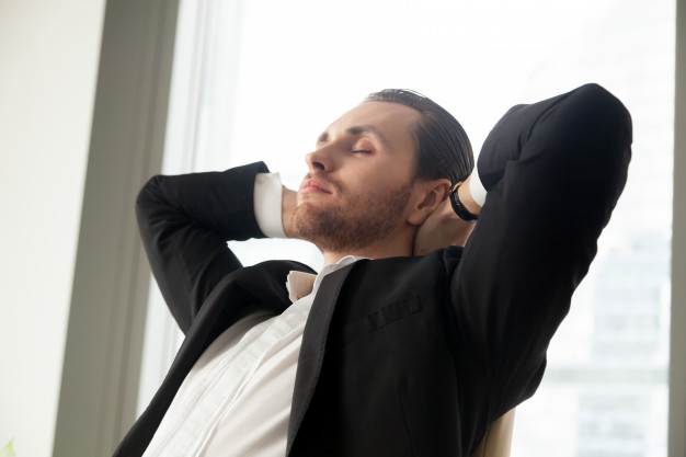 Young businessman resting at work