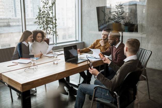 people having a meeting in the office 