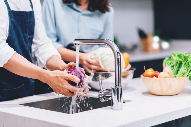 couple doing housework together; healthy relationship