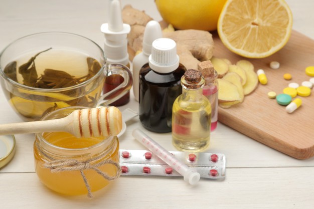 various-medicines-flu-cold-remedies-white-wooden-table