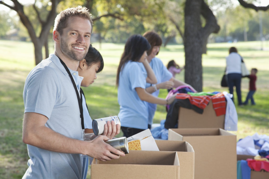 man volunteering at a certain community