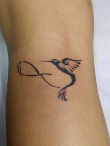 Delicate and Meaningful Hummingbird Tattoos for Men