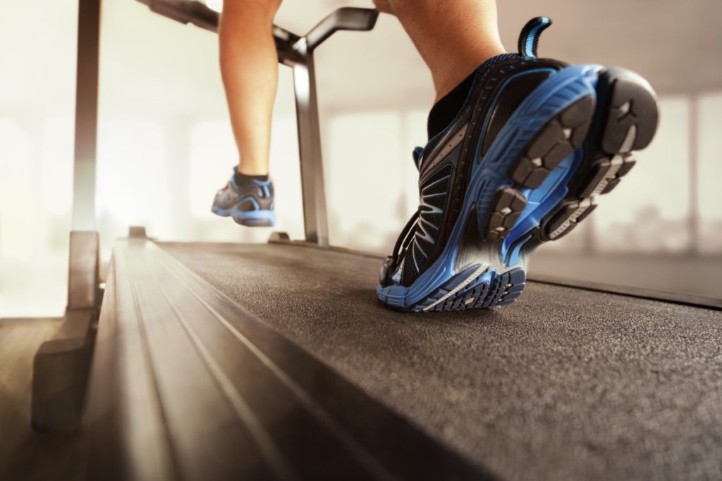 man-running-treadmill-gym