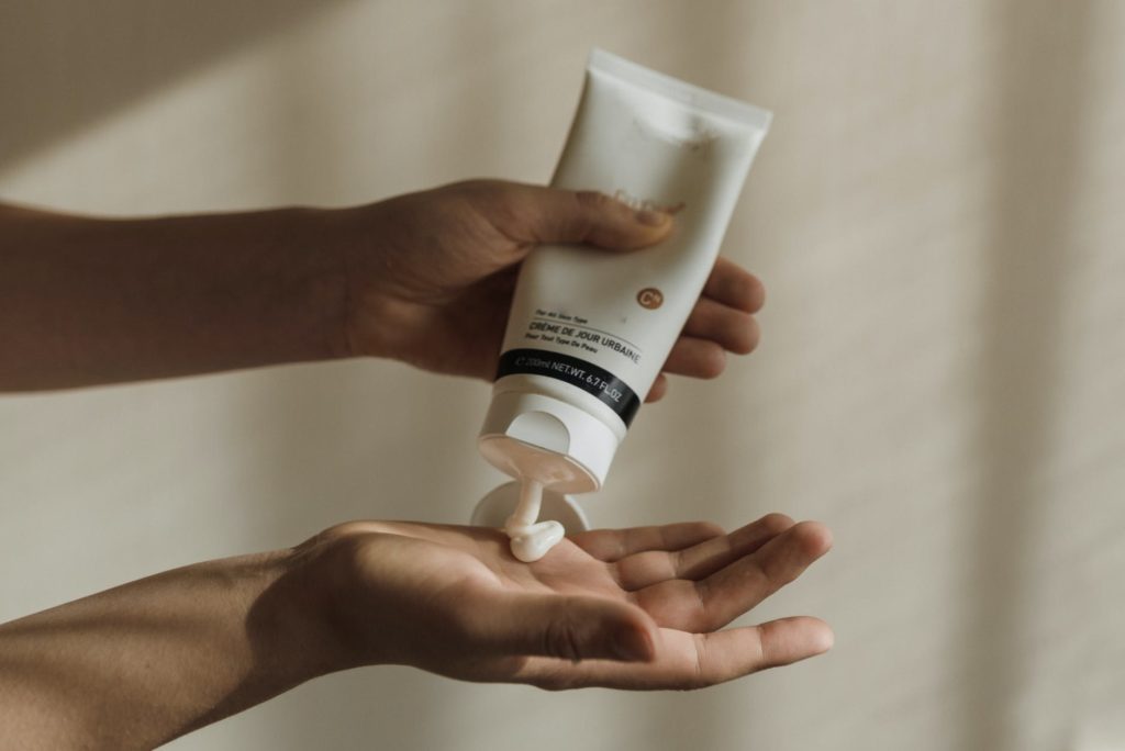 man holding beauty product