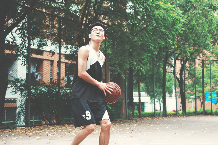 man playing basketball