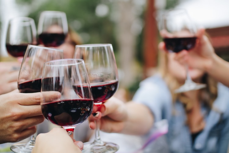 cheering wine with friends