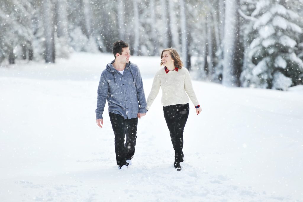 Couple walking in the snow
