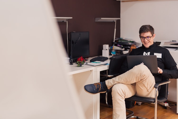 man working with a laptop