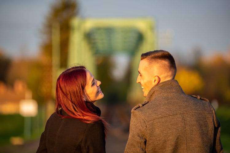 couple smiling on the road
