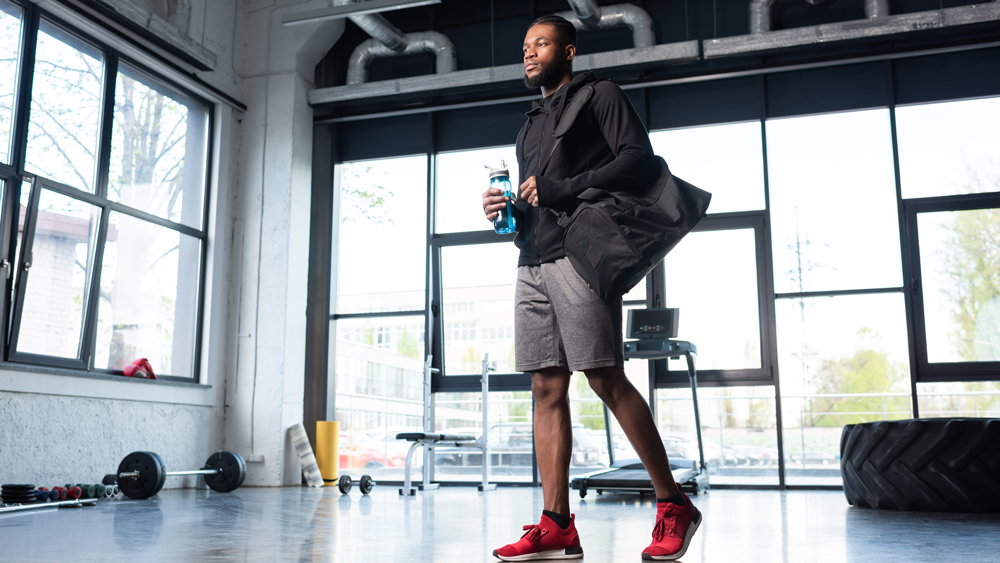 Man holding Reusable water bottle