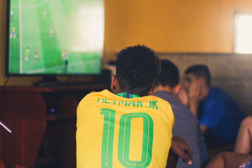 man watching Football match